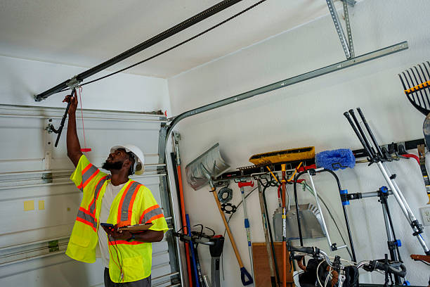 Professional Garage Door Roller Replacement technician working in East Williston, NY